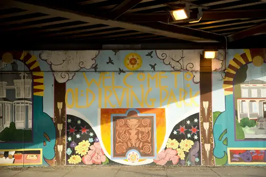 Mural painted underneath viaduct near apartments in Old Irving Park Chicago