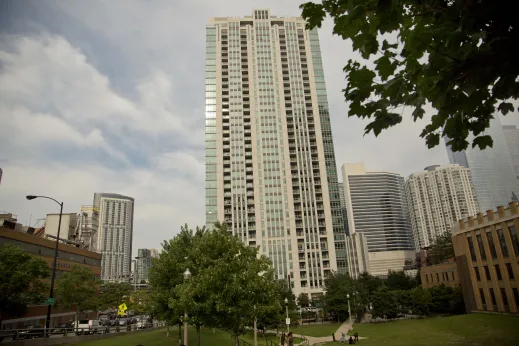 Park next to apartment building high rise in Fulton Market Chicago