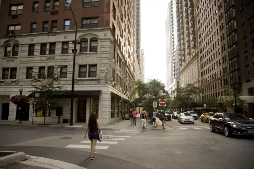 Pedestrian crossing Wabash Street in the Gold Coast Chicago