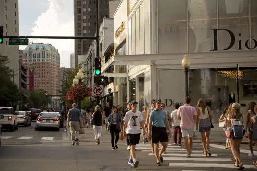 Pedestrians crossing Walton Street in the Gold Coast Chicago