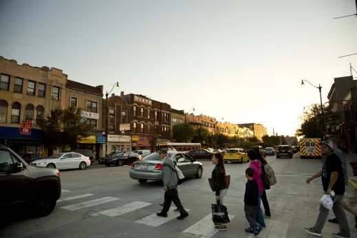 Pedestrians on crosswalk at W Cermak Ave in Chinatown