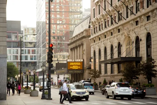 Pedestrians and traffic light near DePaul University downtown campus in the South Loop