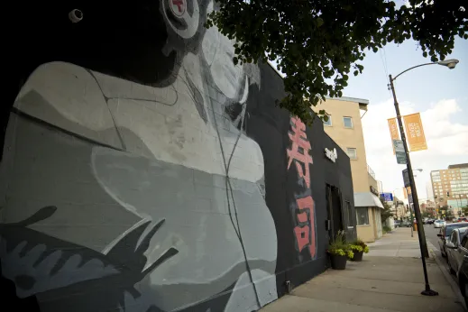 Public art mural wall on sushi restaurant on W Chicago Ave in River West Chicago