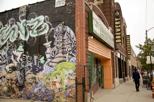 Public art wall and mural near Forbidden Root Brewery and restaurant on W Chicago Ave in East Village