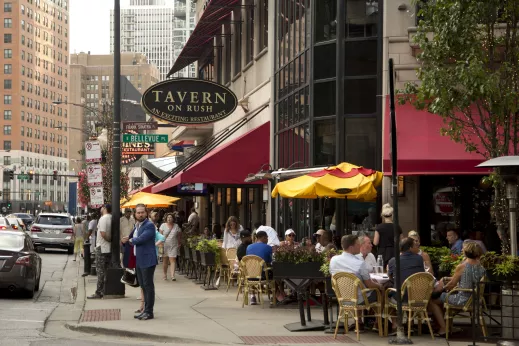 Restaurant patrons dining outside at Tavern on Rush in the Gold Coast Chicago