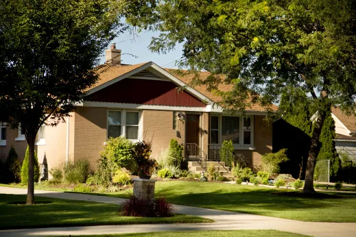 Single family home and front lawn in Norwood Park Chicago