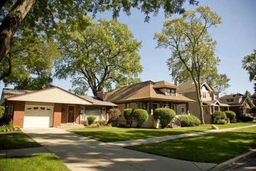 Single family homes and front lawns in Edison Park