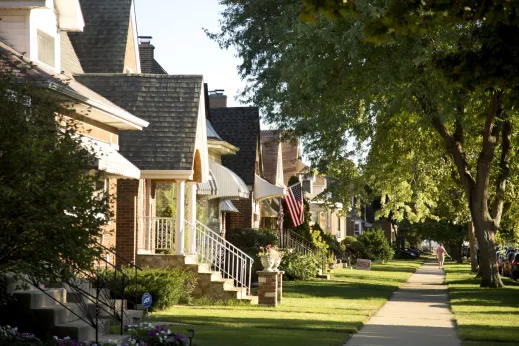 Singles family homes and sidewalk by front yards in Norwood Park Chicago