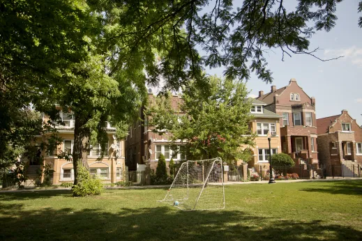 Soccer goal in public park with apartments in Little Village Chicago