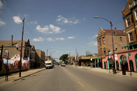 Two way street with apartments and restaurants in Little Village Chicago