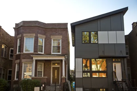 Vintage apartments and modern apartments on neighborhood street in Woodlawn Chicago