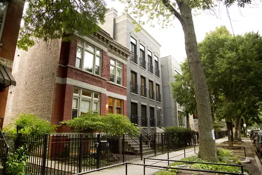 Vintage apartments next to modern apartment buildings in East Village Chicago