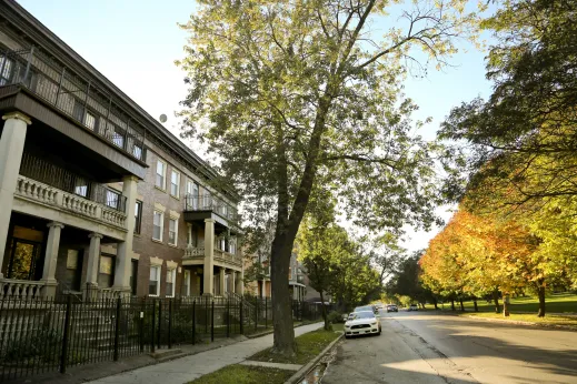 Vintage apartments with front balconies across from Washington Park Chicago