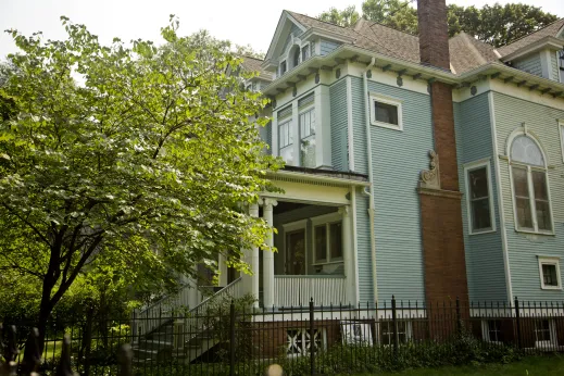 Vintage mansion side yard iron fence in Sheridan Park Chicago