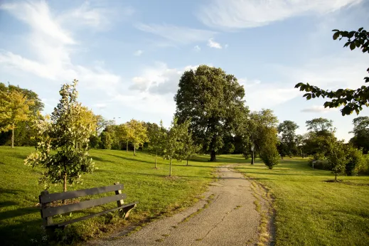 Winding pathway through public park by apartments in North Lawndale Chicago