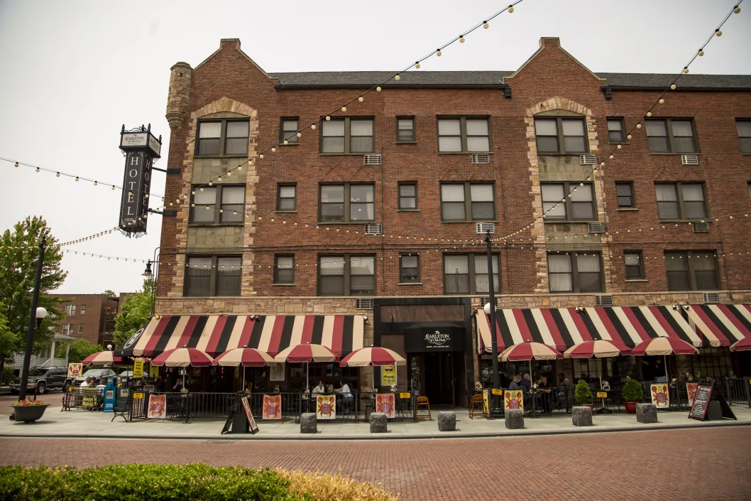 Carleton of Oak Park entrance patio people dining awning Oak Park Illinois