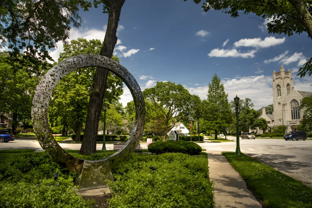 Circle statue church street cars metal Wilmette