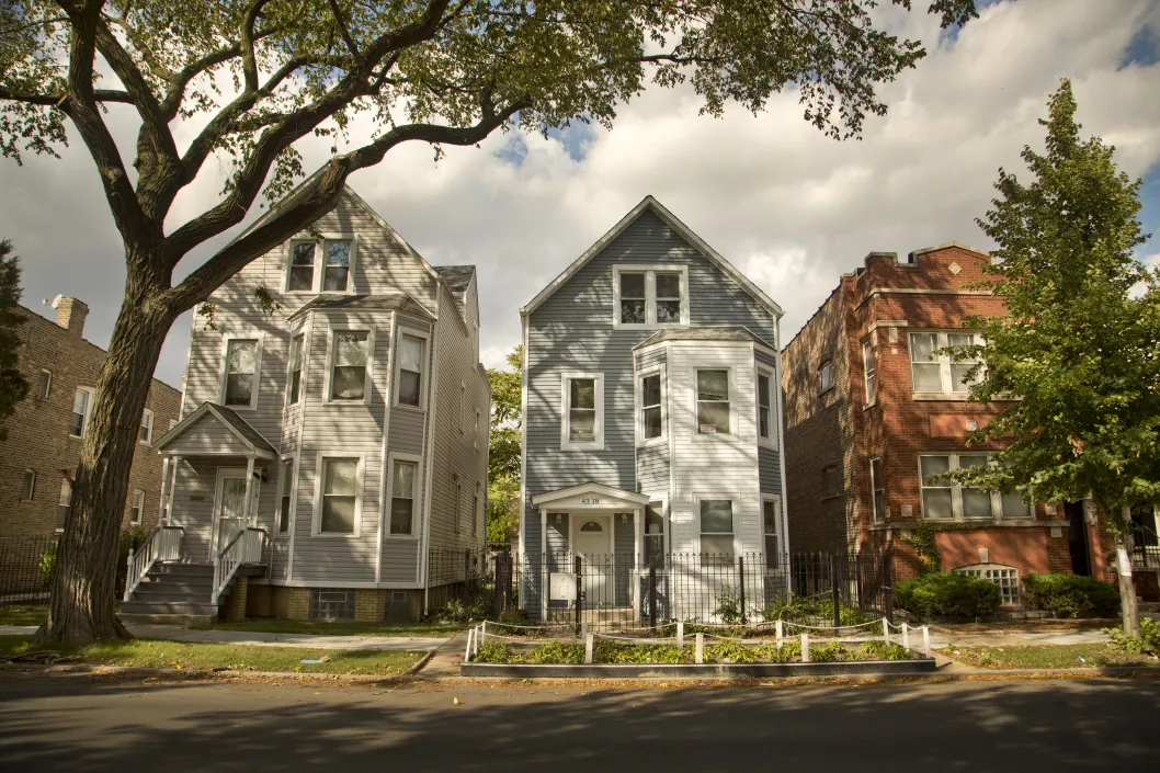 Three flat apartments on neighborhood street in Austin Chicago