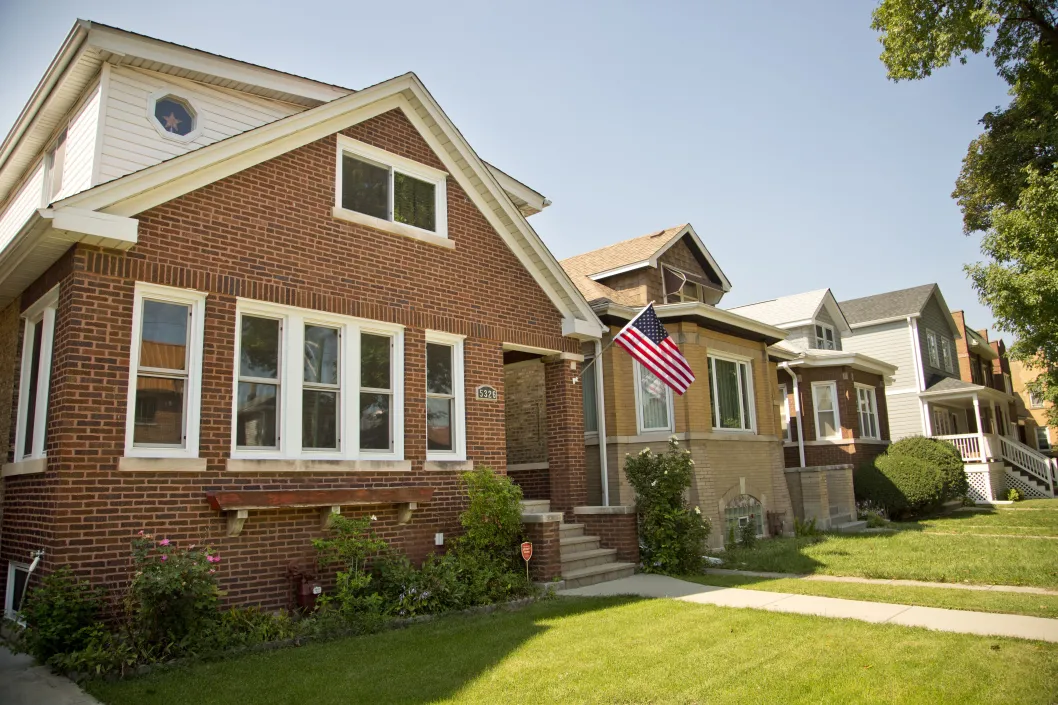 Brick bungalow houses and front yards in Jefferson Park Chicago