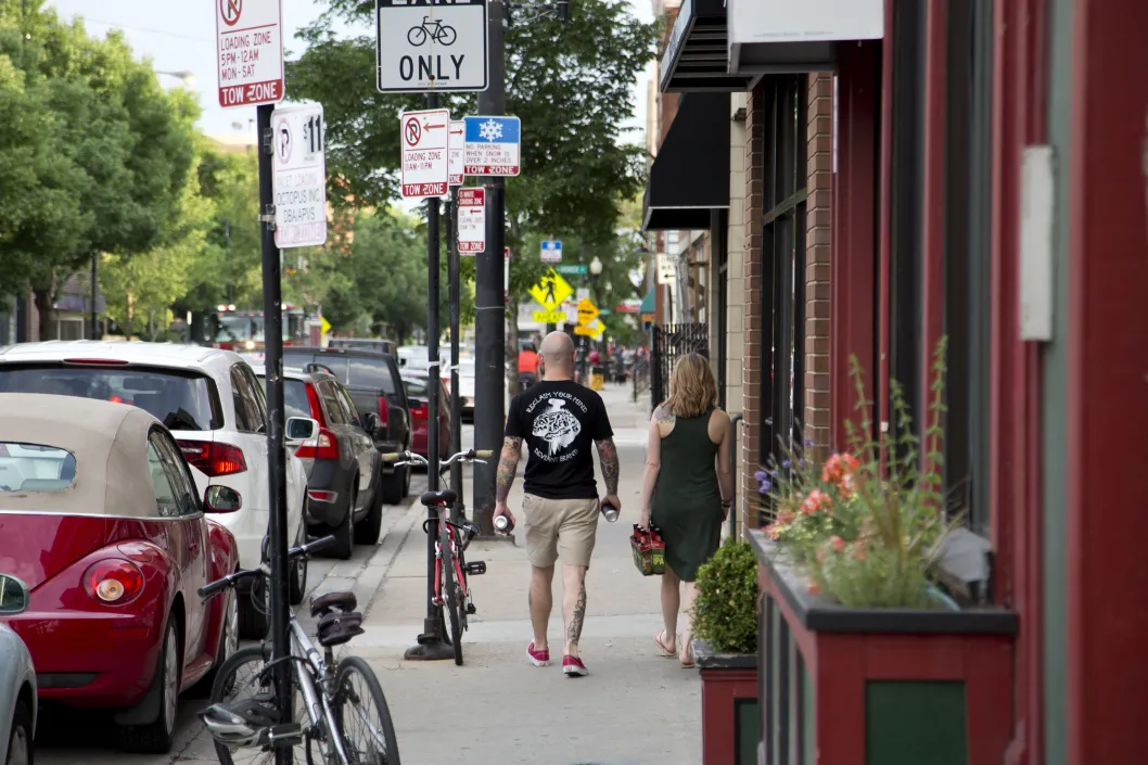 Couple walking on street in Bucktown Chicago