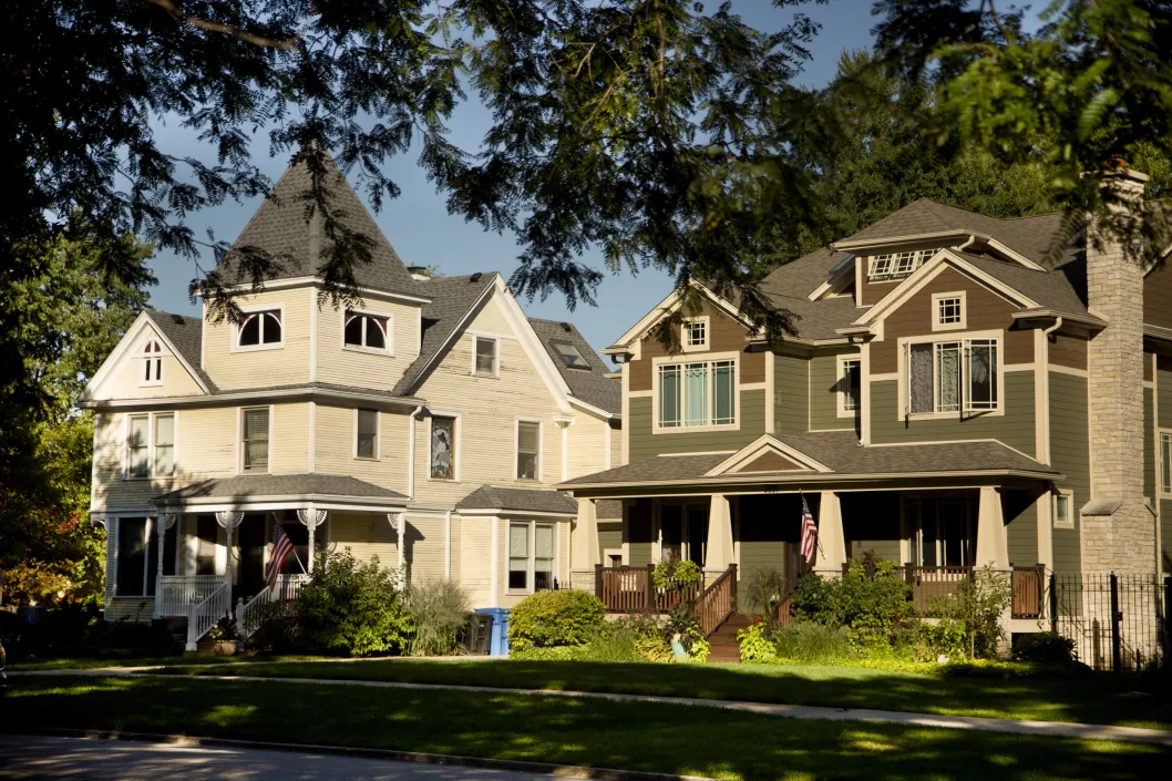 Craftsman style house and Victorian style house in Norwood Park Chicago