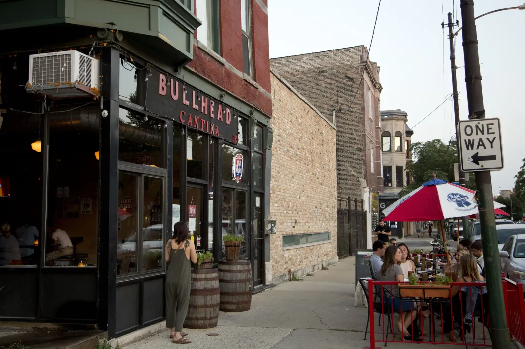 Diners on outdoor patio at Bullhead Cantina in Chicago
