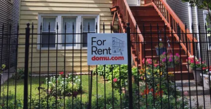 domu-for-rent-sign-iron-fence